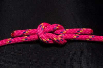a pink rope tied into a knot